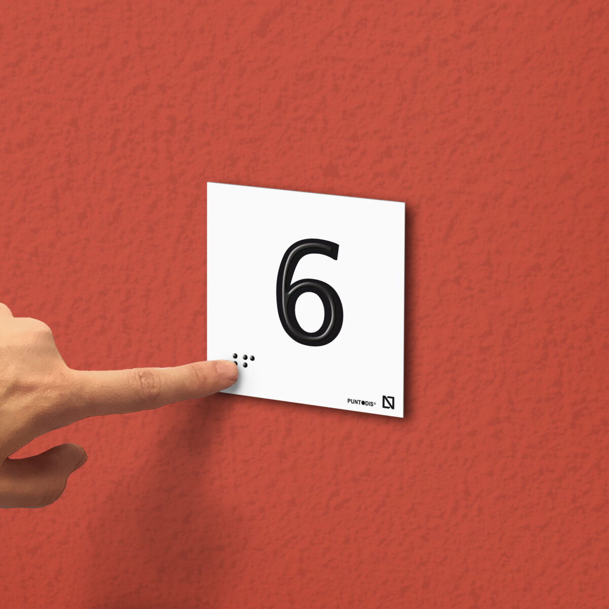 Ejemplo de colocación en pared de la placa del número 6
