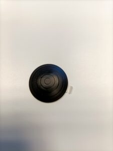 botón podotactil negro